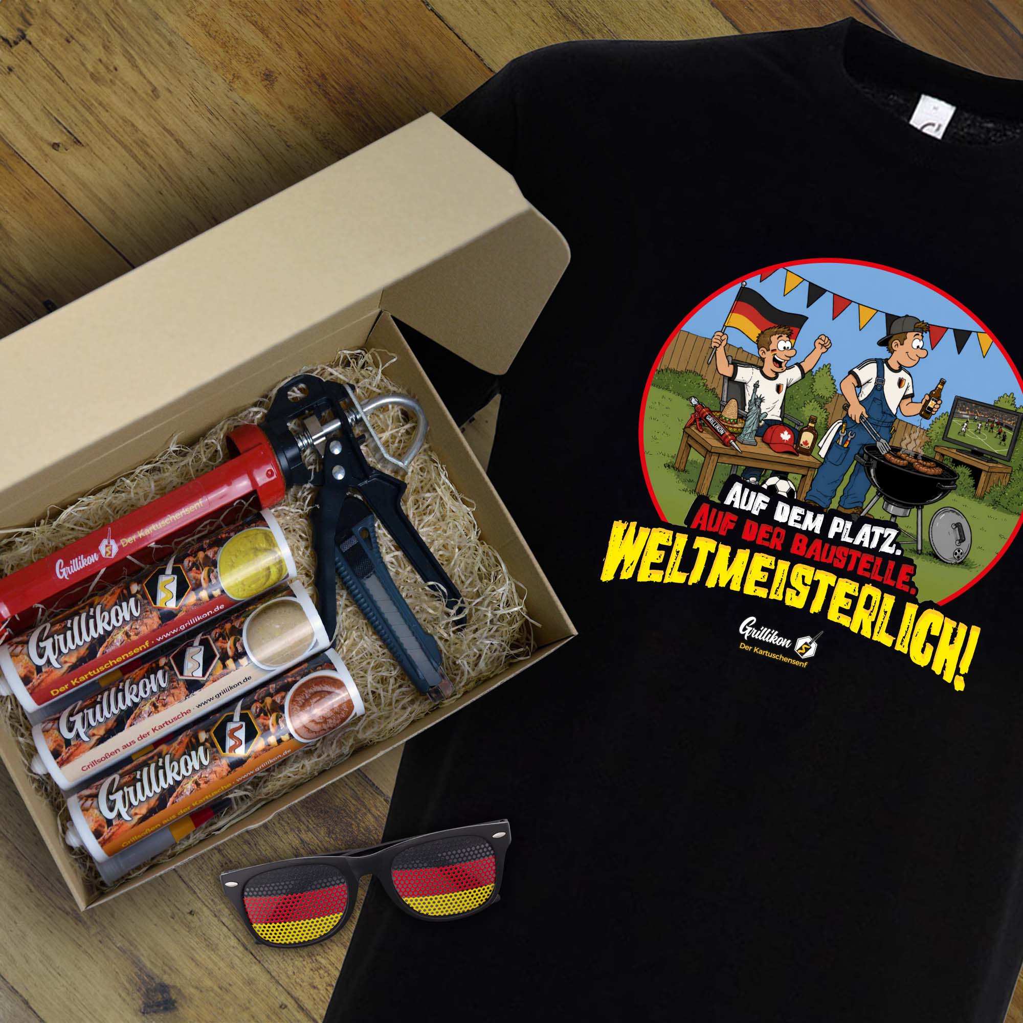 Grillikon Geschenkset „WM-Edition“ mit 3x Mix in 300-ml-Kartuschen, Kartuschenpistole, Fanbrille Deutschland und schwarzem WM-T-Shirt im Geschenkkarton
